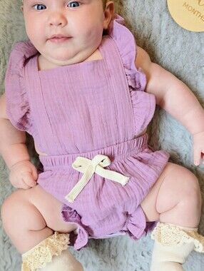 Reverie Threads Plum Ruffle Baby Romper with Cream Bow